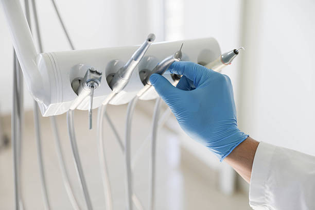 Professional Tooth Extraction technician working in Woodall, OK